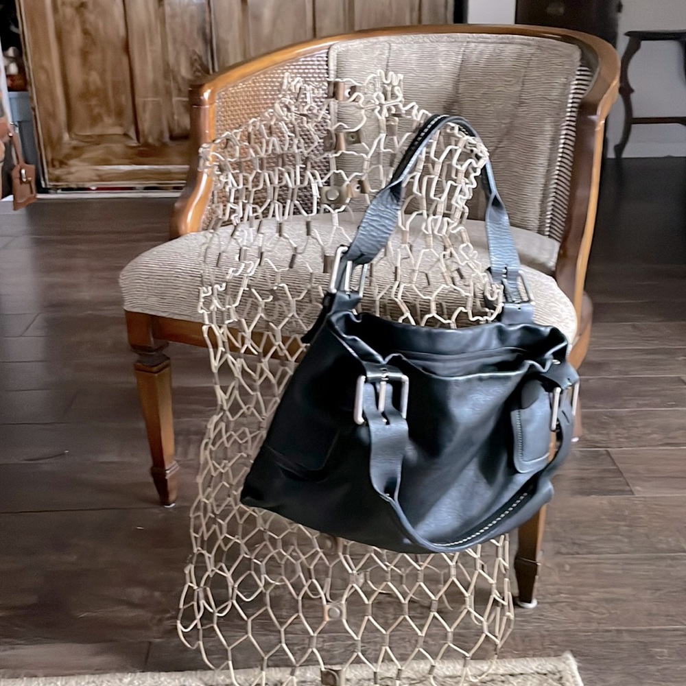Black high end new condition leather bag